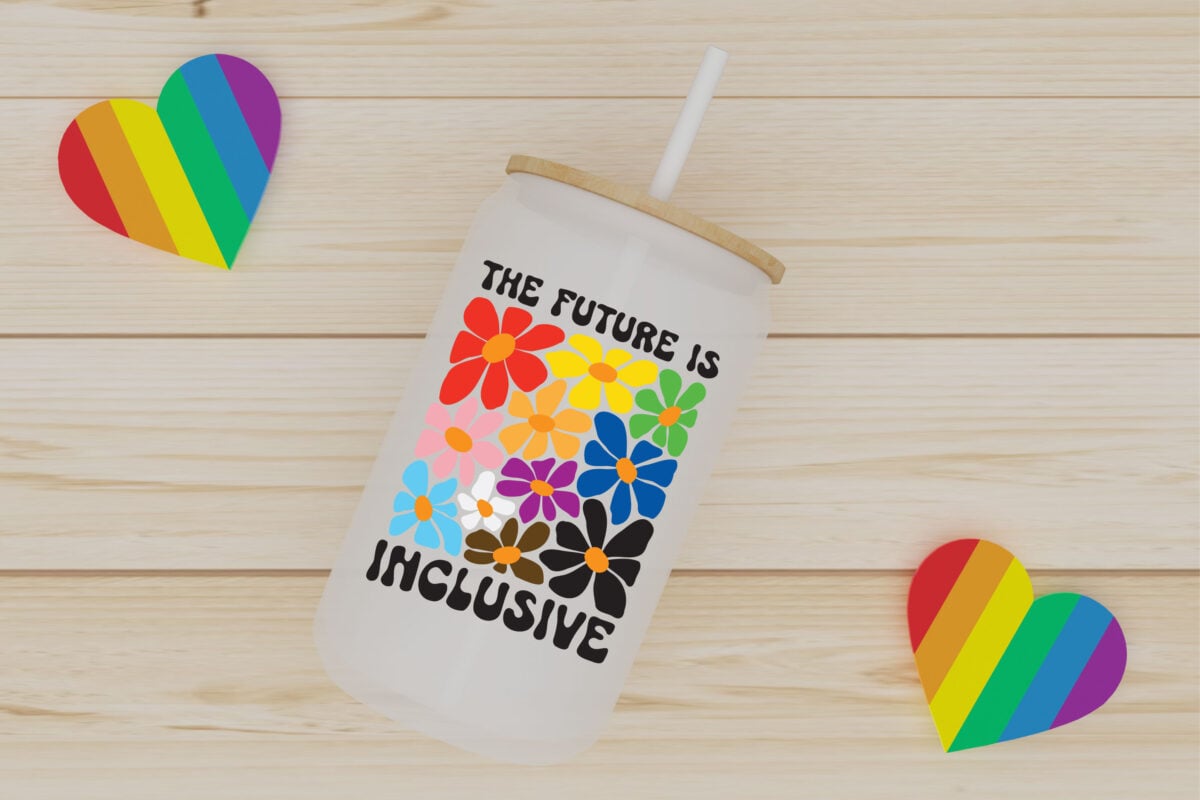 Tumbler that has "the future is inclusive" SVG with a pride flag hearts