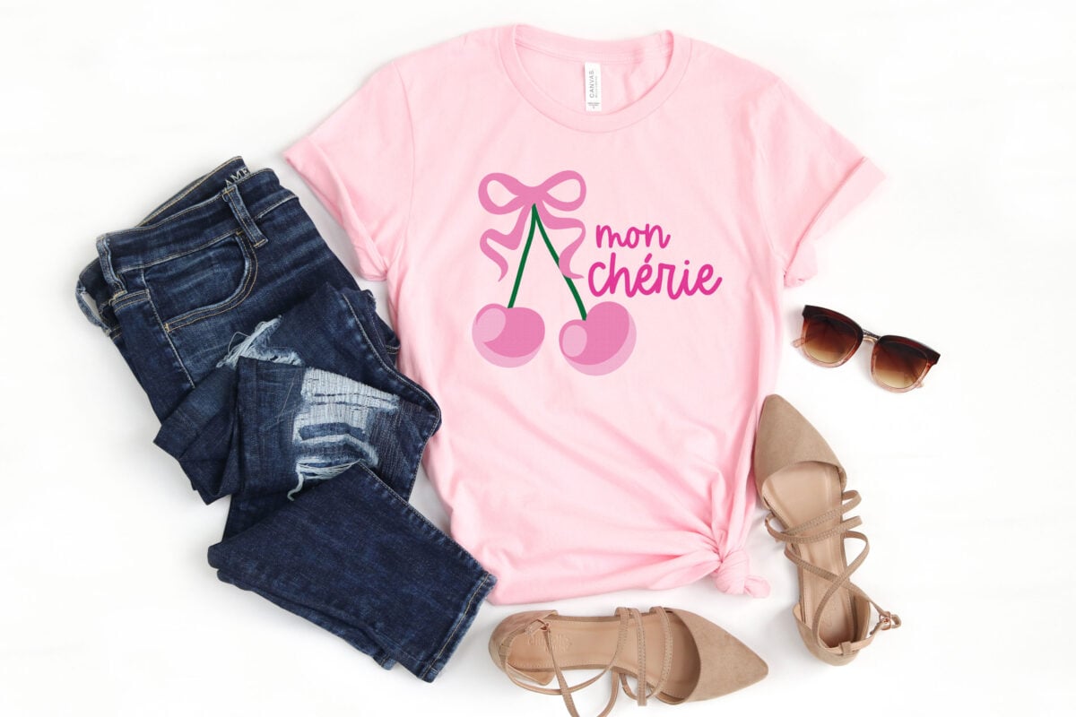 Mon Cherie cherry SVG on a pink shirt with girlie accessories