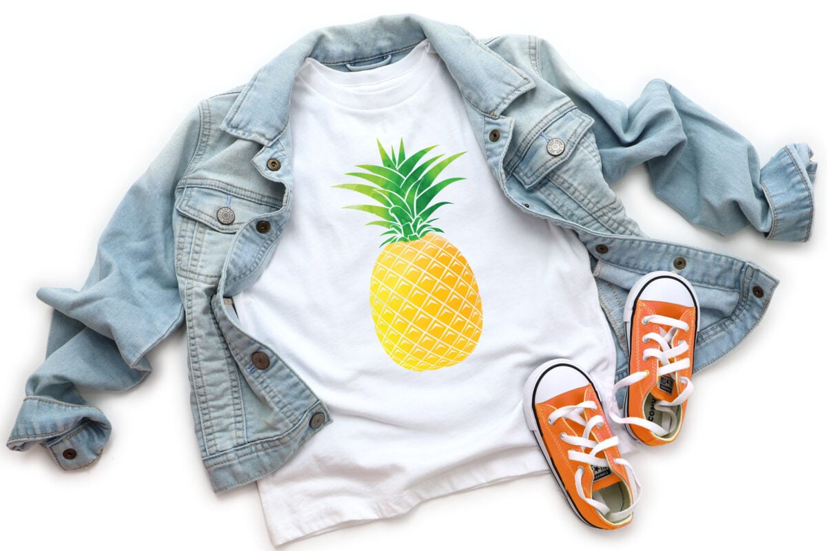 White kids shirt with pineapple image on it