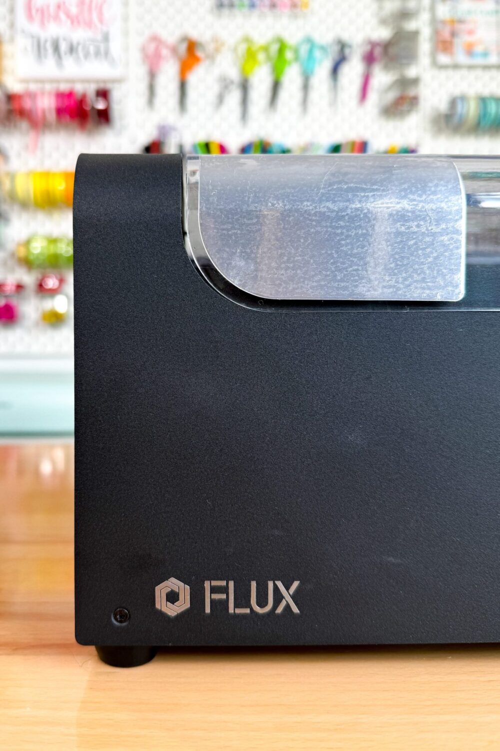 Close up of FLUX logo on beamo