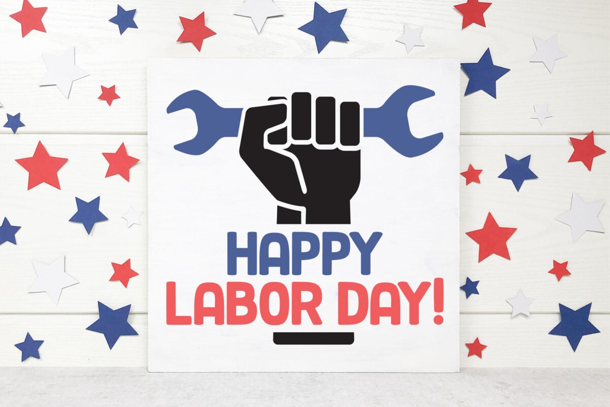 Mockup of Happy Labor Day SVG on a sign with red and blue stars