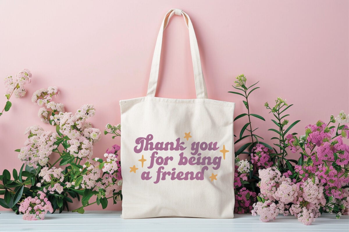Thank You For Being a Friend Golden Girls SVG on tote bag surrounded by flowers