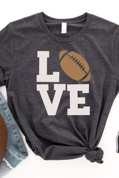 LOVE Football SVG on gray shirt with football decor