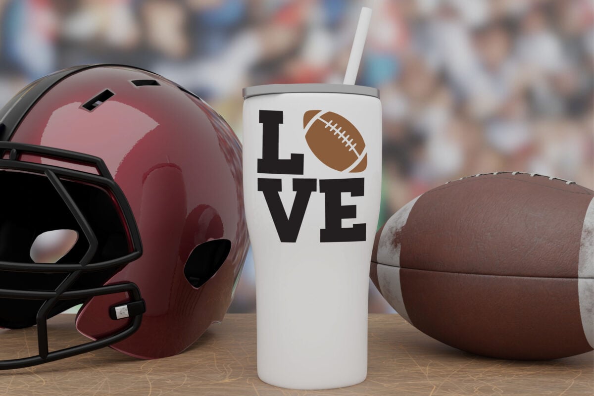 LOVE Football SVG on white tumbler with football decor