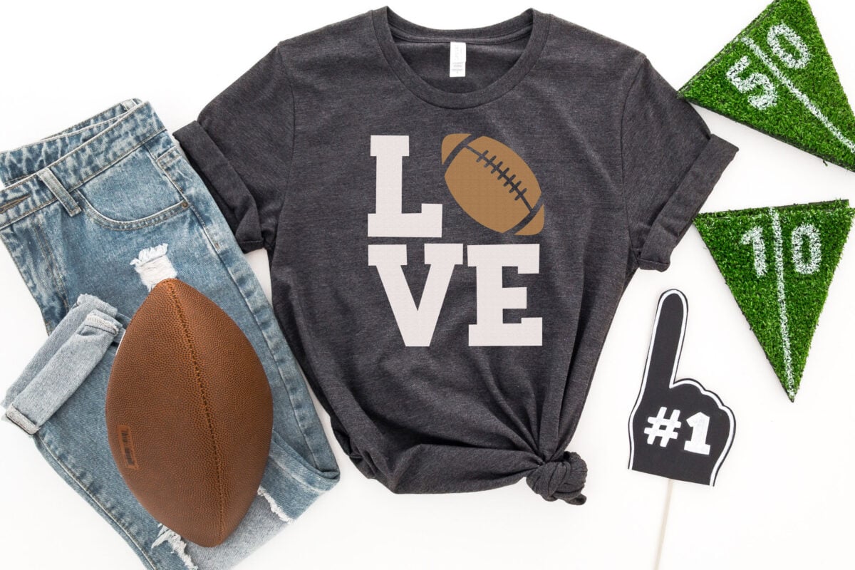 LOVE Football SVG on gray shirt with football decor