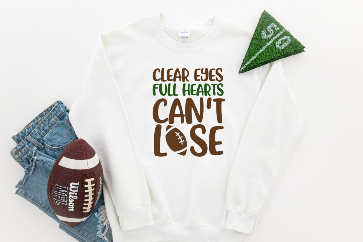 Clear Eyes, Full Hearts, Can't Lose SVG on a t-shirt with a football
