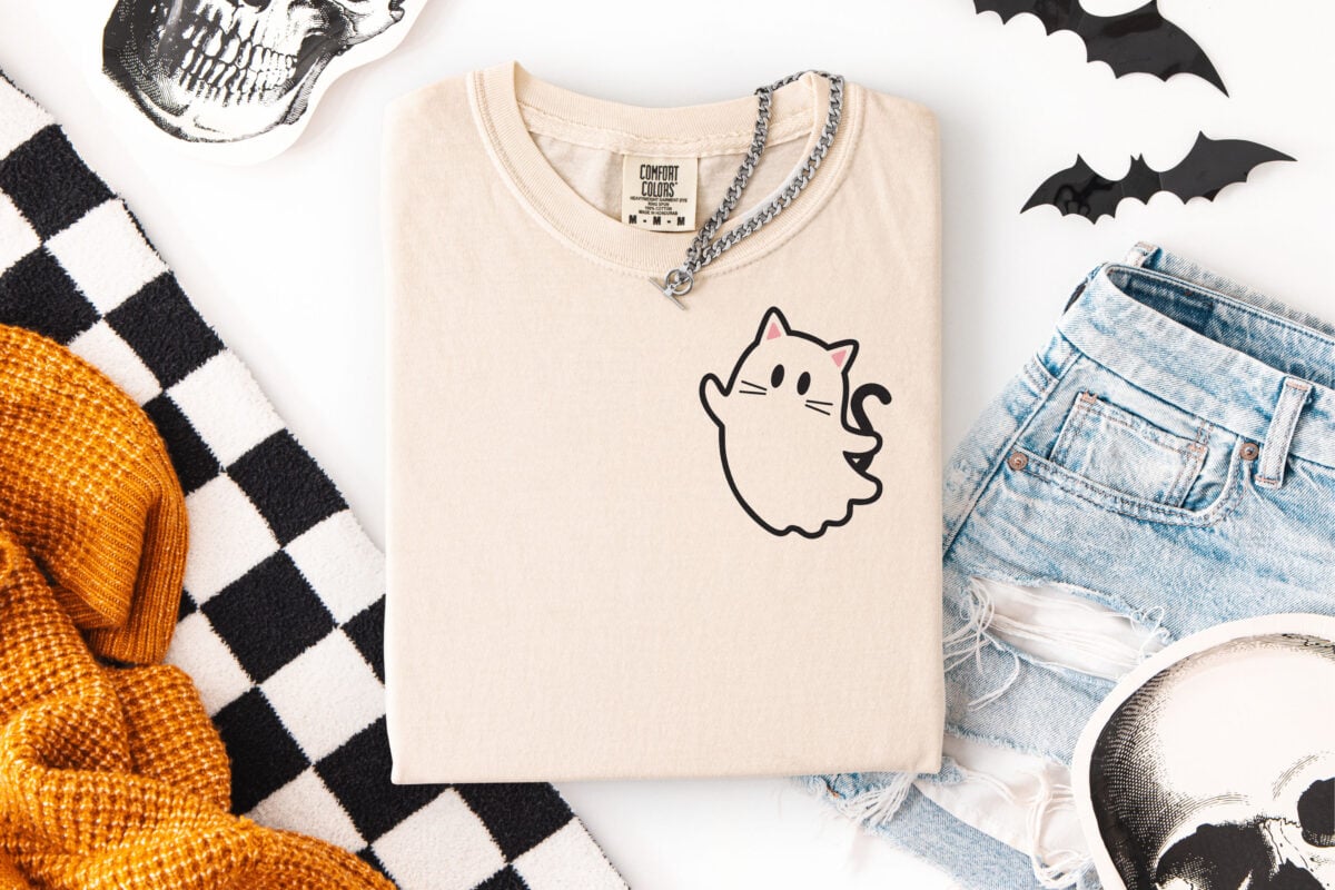 Cat ghost SVG on a natural colored tee with Halloween accessories