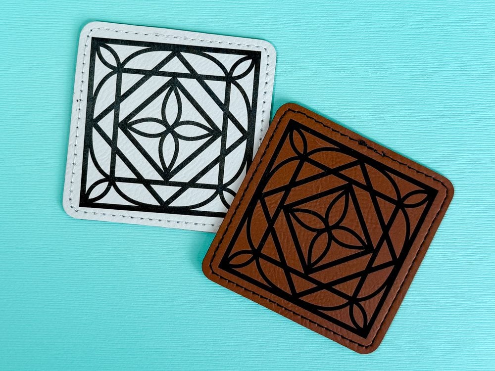 Engraved leather patches on a blue background