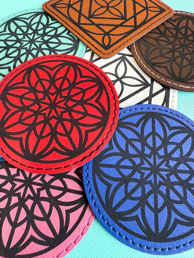 Engraved leather patches on a blue background