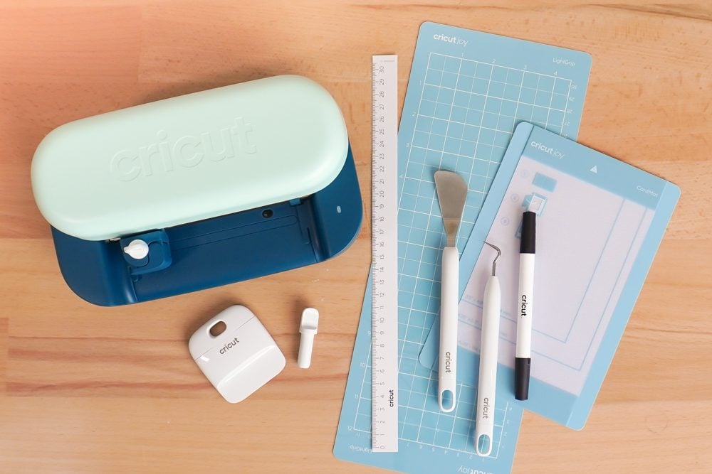 Cricut Joy 2 Essentials Bundle tools and mats on a table