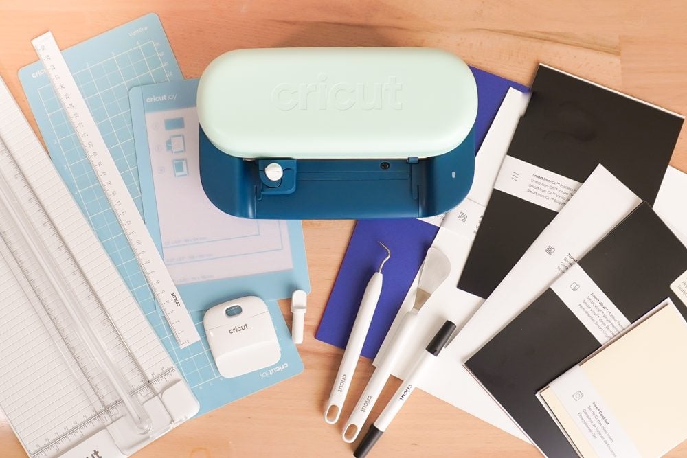 Cricut Joy 2 Essentials Bundle materials and tools and mats on a table