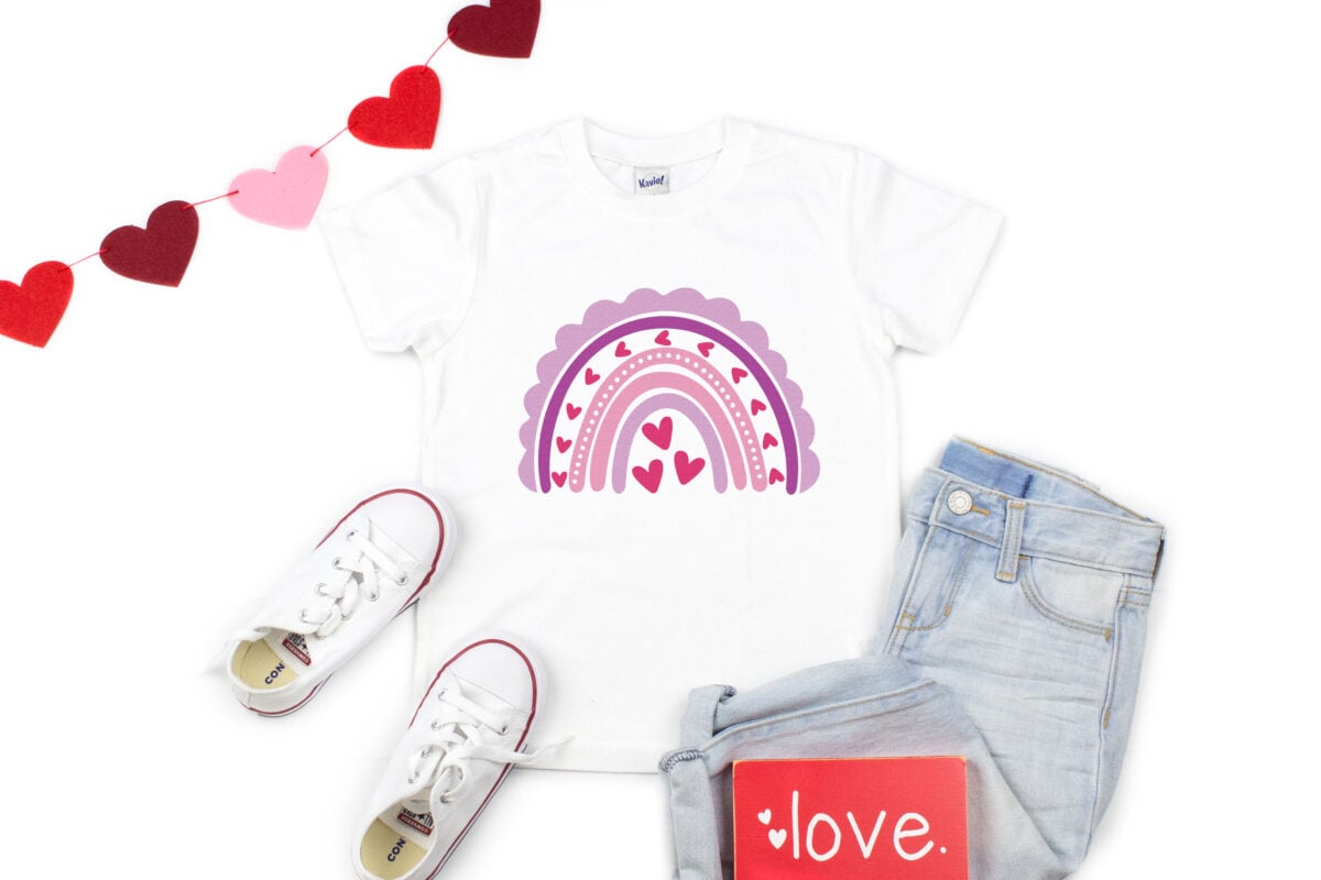 Valentine's Day Rainbow SVG on a white t-shirt with accessories
