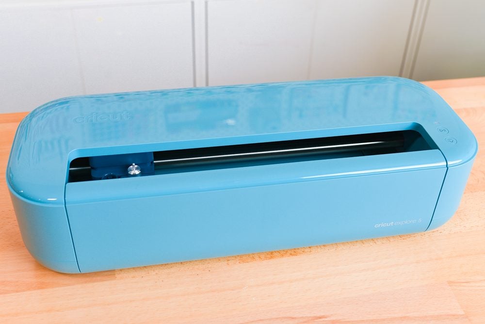 Cricut Explore 5 on a table, with the door closed