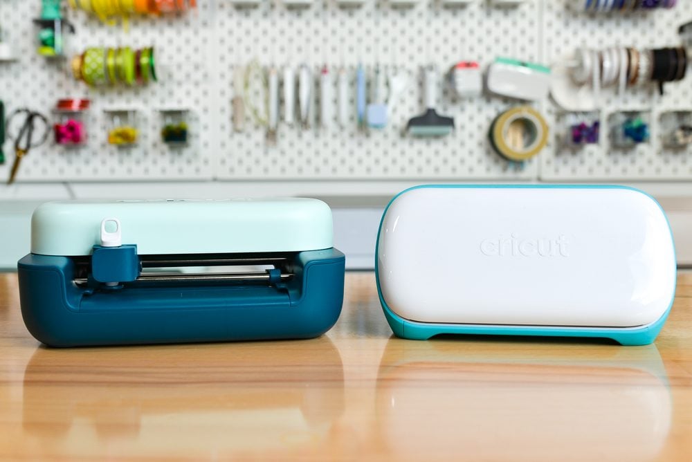 Cricut Joy 2 and Cricut Joy on a table
