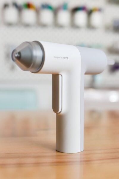 HOTO Hot Glue Gun on a table