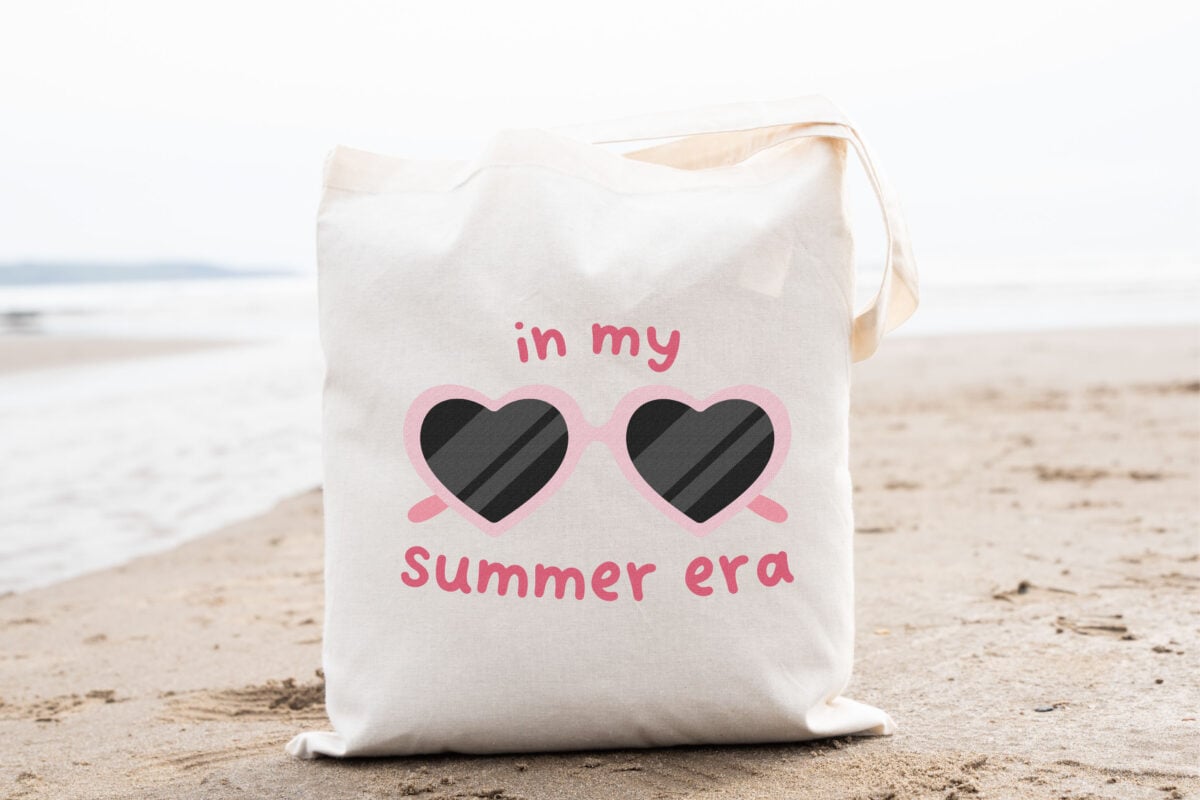 In My Summer Era SVG on a tote sitting on the beach