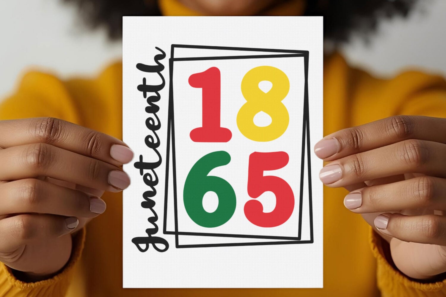 Free Juneteenth SVG on a card being held by a Black woman